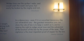Quotes on the wall inside of Wassersetein Hall related to the rule of law. The first reads: "'Written laws are like spiders' webs, and would catch the weak and poor, but easily be broken by the mighty and rich.'” -Anacharsis" The second reads: “'In a democracy - even if it is a so-called democracy like our white-élitist one - the greatest veneration one can show the rule of law is to keep a watch on it, and to reserve the right to judge unjust laws and the subversion of the function of the law by the power of the state. That vigilance is the most important proof of respect for the law.' -Nadine Gordimer"